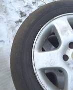Автомобильные шины Dunlop с оригинальными дисками - Фото #5