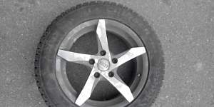 Шины Bridgestone Ise Cruizer205/55R16 91T на диске - Фото #1